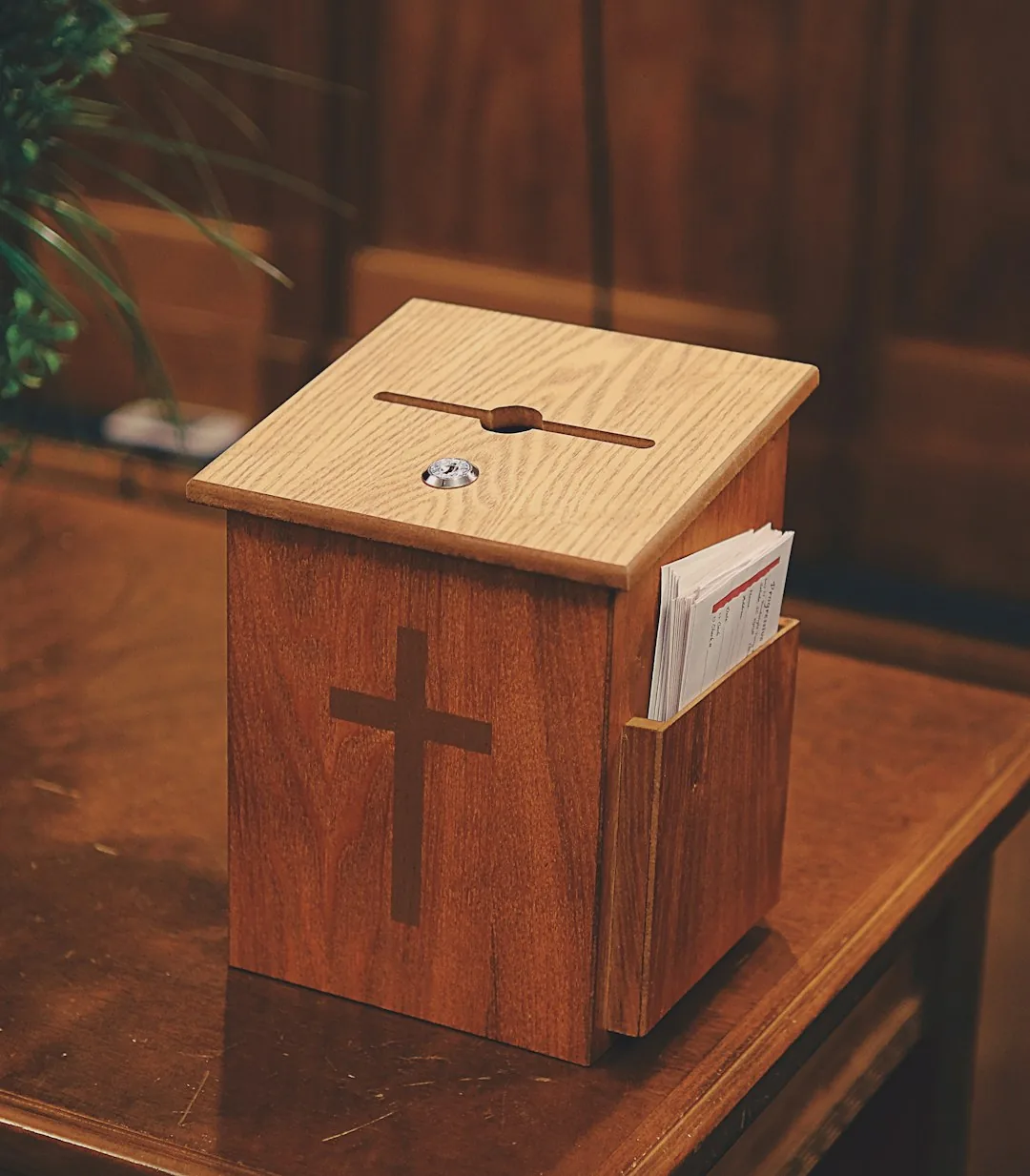 The offering box at the back of the auditorium